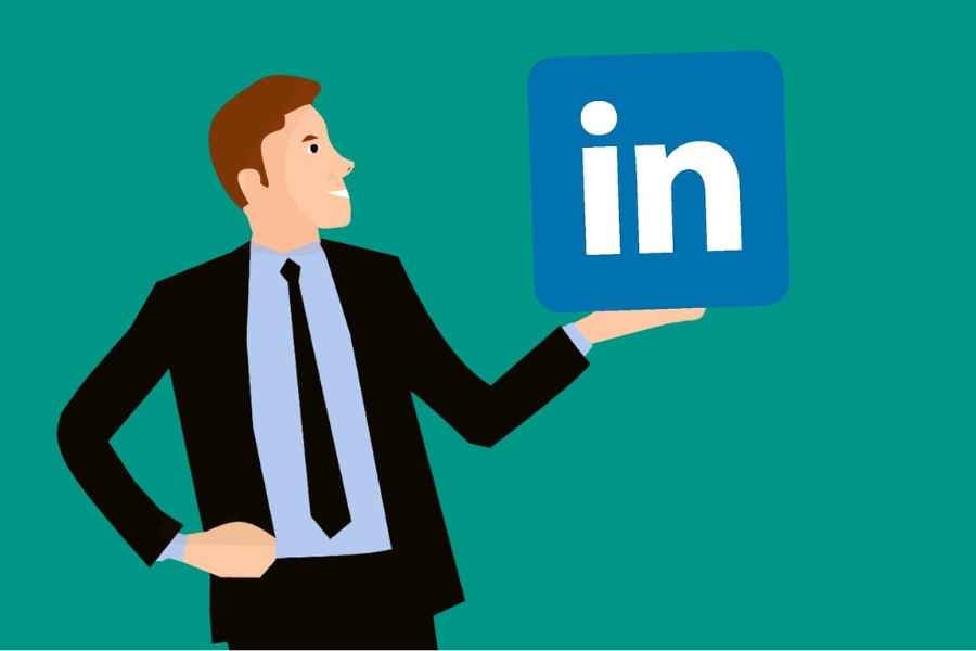 cartoon businessman holding linkedin logo