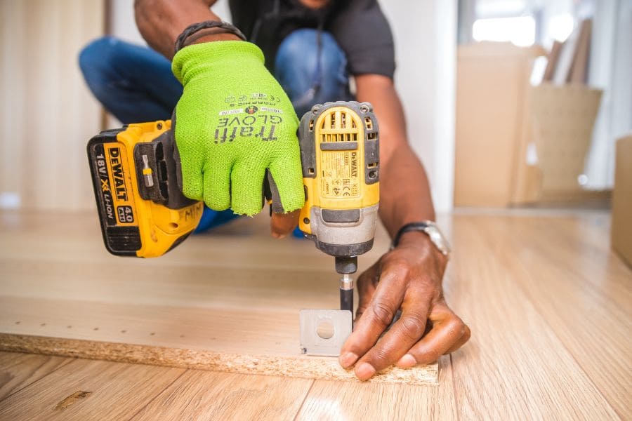 a man using a power drill