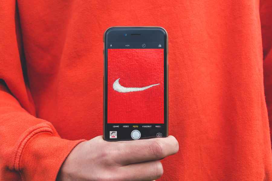 a nike swoosh on a phone screen